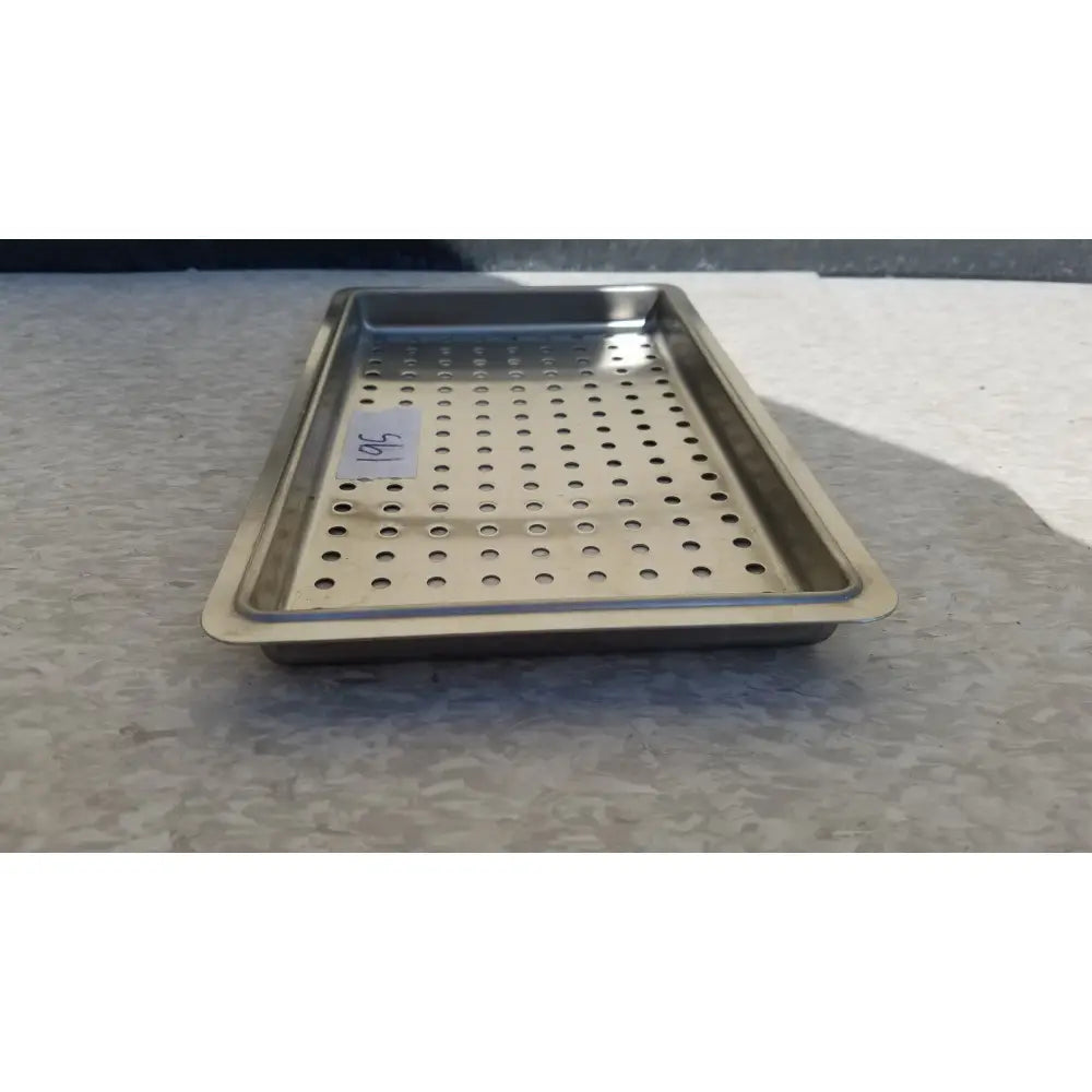 Rectangular stainless steel perforated tray with raised rim for instrument sterilization case layer use