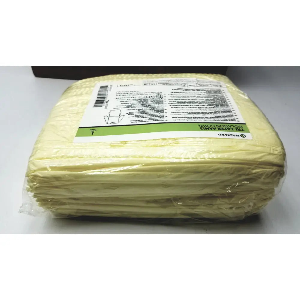 A package of yellow 10-layer insulation pads from halvad included in a 100 count case halyard tri layer isolation gown size l