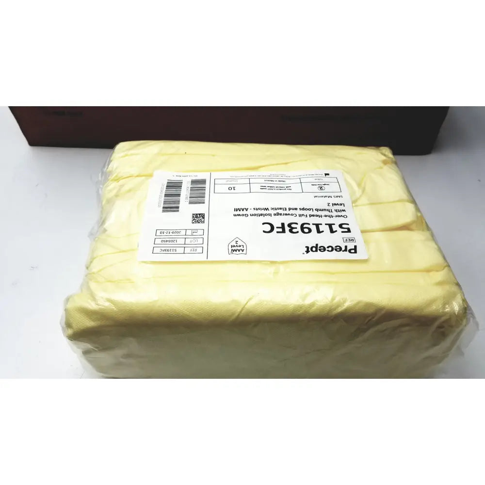 Yellow precept medical isolation gowns count 100 wrapped in clear plastic with visible shipping label 51193fc
