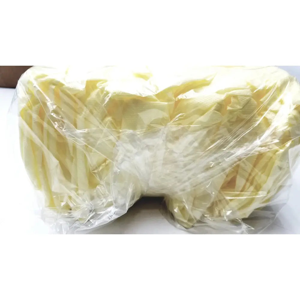 A crinkled transparent plastic wrap encasing pale yellow thin strips of 100 count precept medical isolation gowns