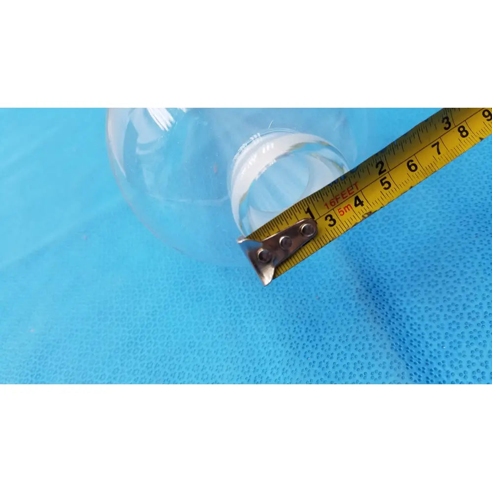 Clear plastic 1000ml kimax separatory funnel glass with metallic silver cap and measurement markings on its side