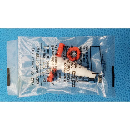 A clear plastic package containing an orange and white teflon kimble stopcock for 1000ml kimax separatory funnel glass