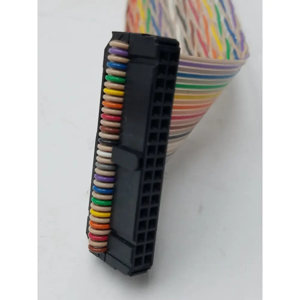 Black plastic 12 pin female cable harness with colorful insulated wires bundled together for secure connections