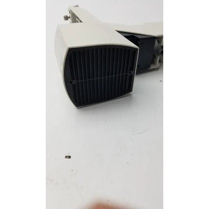 Off-white industrial speaker with black grille showing internal components paired with 12v 100w leica lamp arm for inverted microscope use