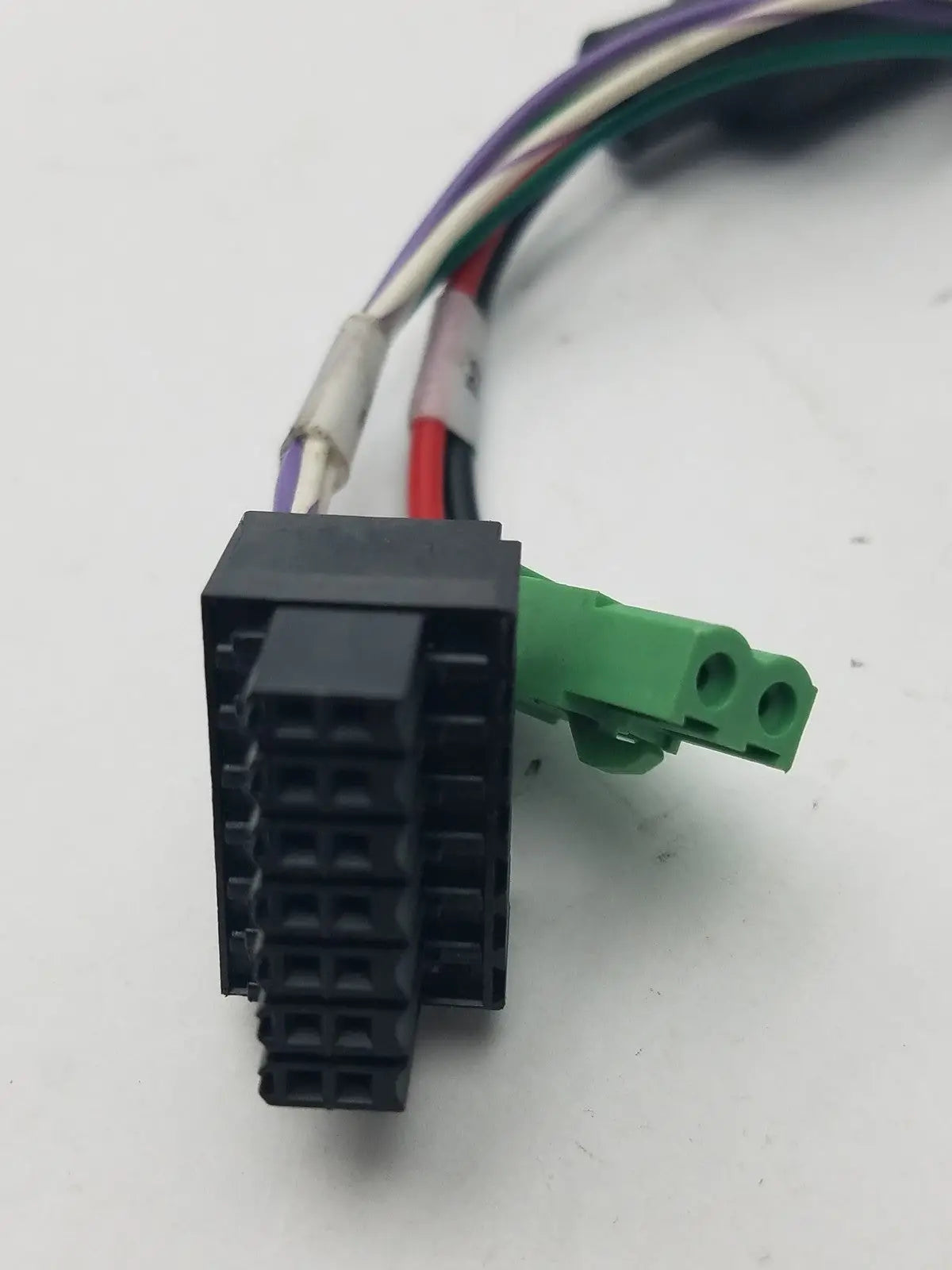 Black plastic 14 pin female connector with green terminal block cable harness and color-coded wire connector cable