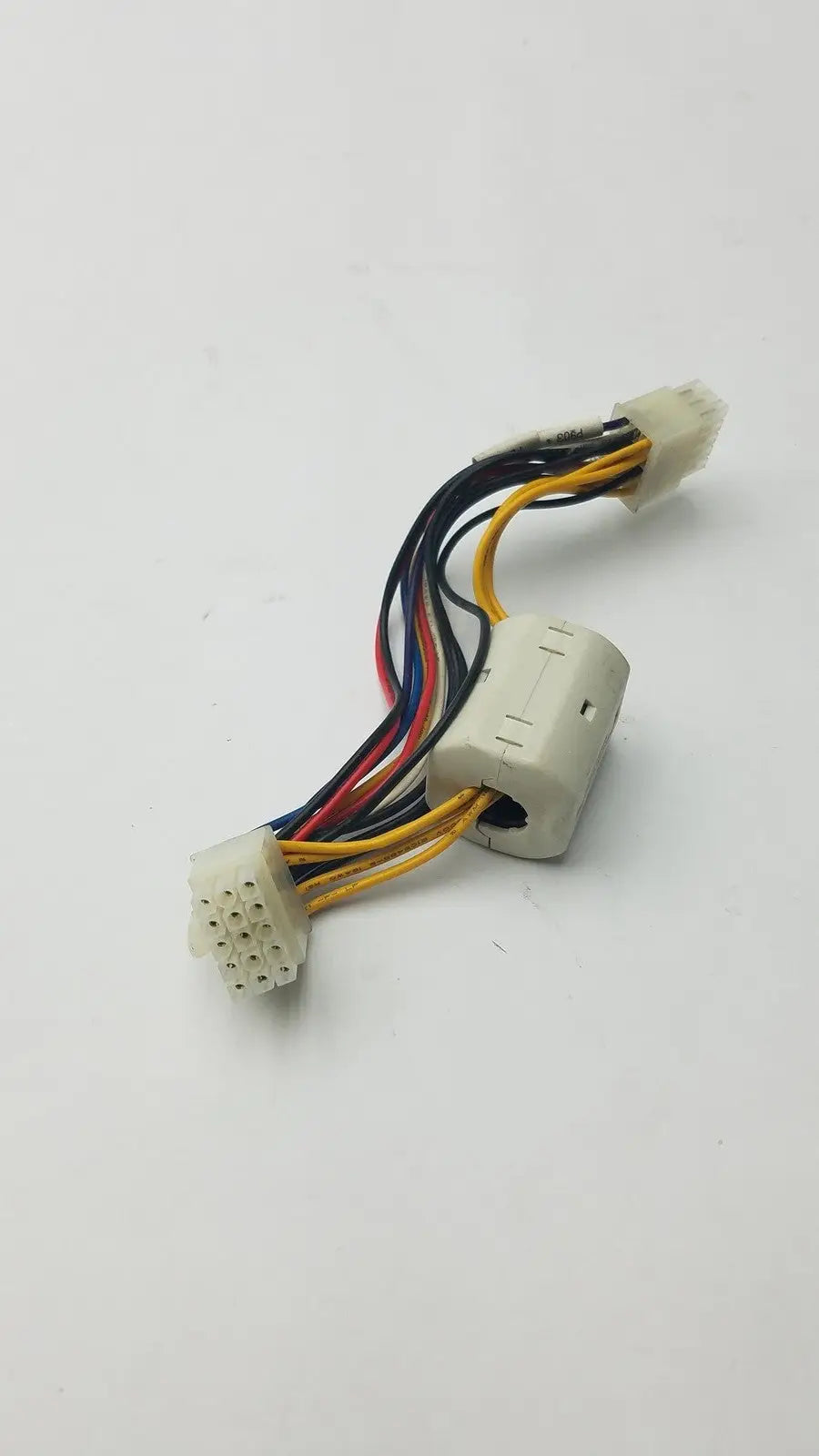 White plastic 15 pin female wire harness with multiple colored wires for secure electrical connections