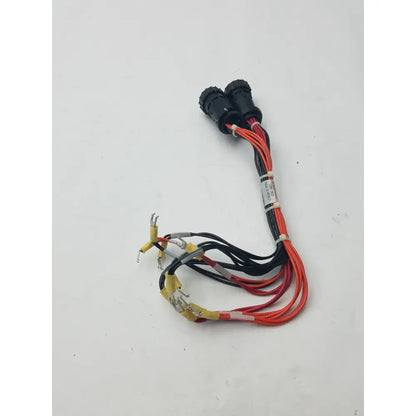 Black and red insulated 16 pin female to pin male wire harness with two black connectors and exposed metal terminals bundled by white ties