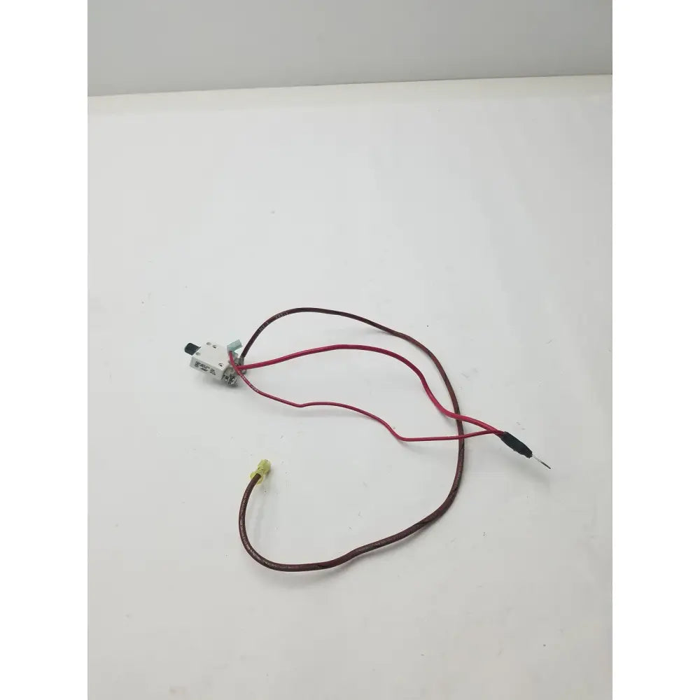 White plastic 70a microswitch 1648-009-070 with red and brown wire leads and black capped insulation visible