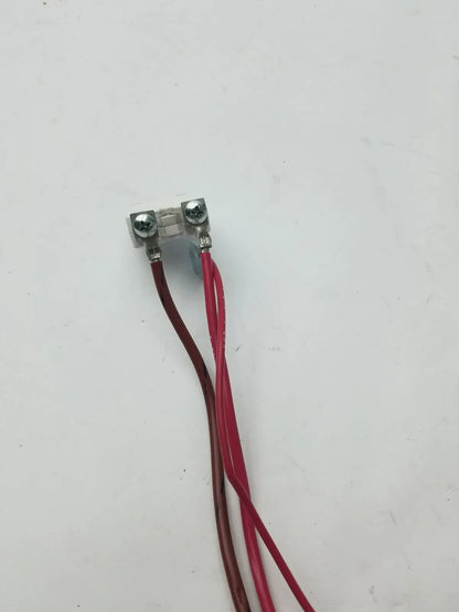 Silver-colored 1648-009-070 70a microswitch with two insulated red and maroon wire leads connected to terminals g-bbde6-60e