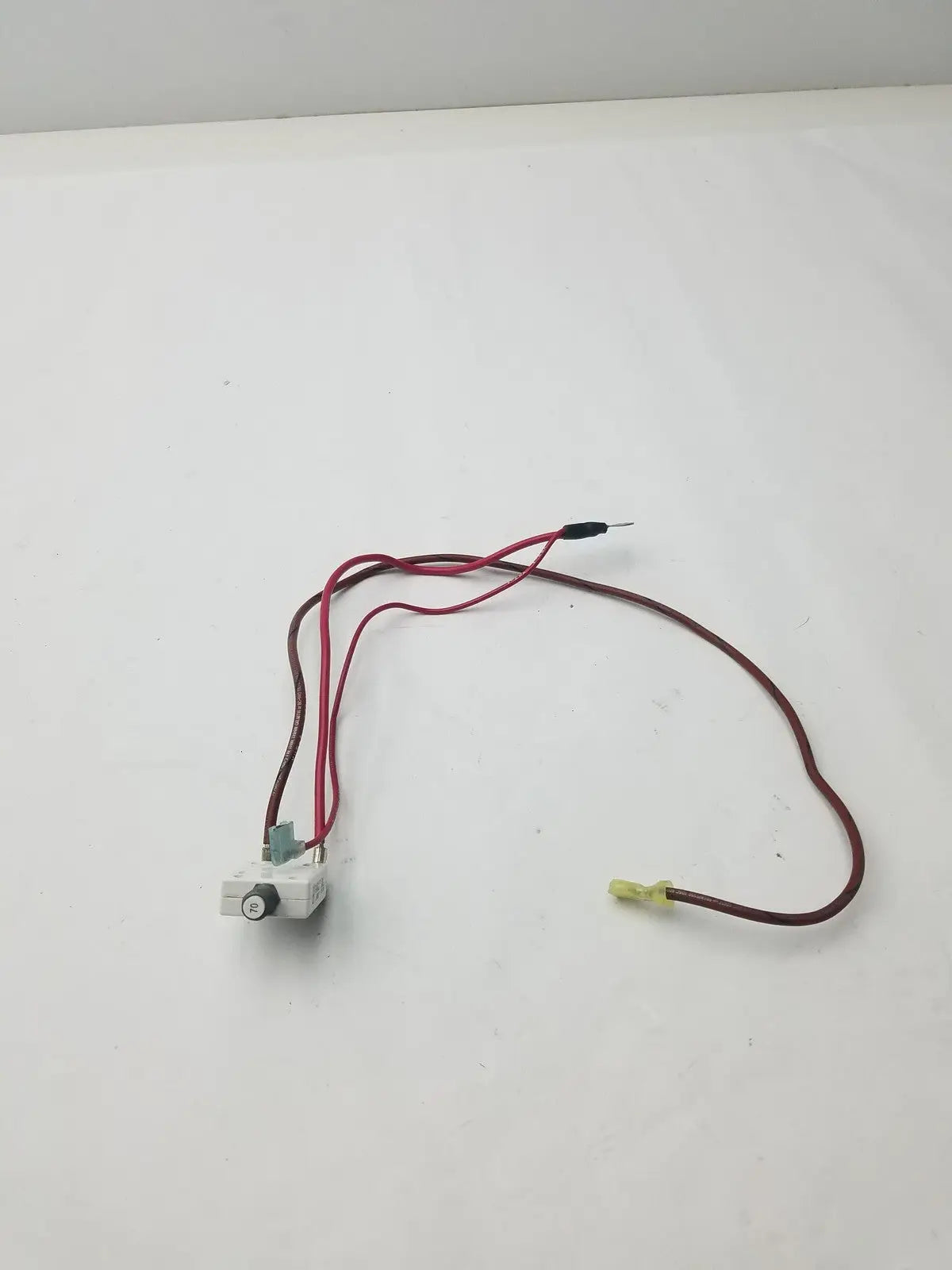 White plastic 70a microswitch with red and brown wire leads model g-bbde6-60e for electrical control applications