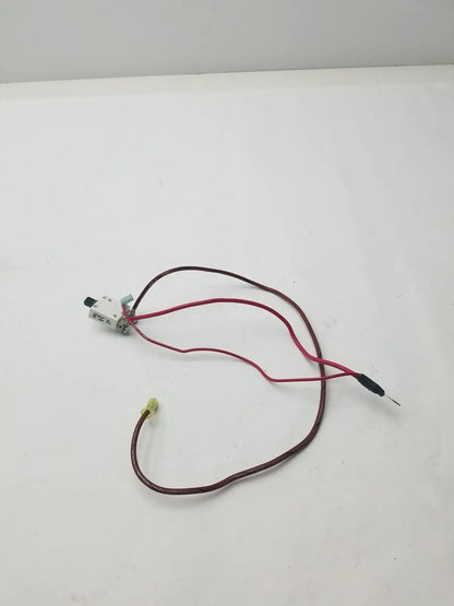 White plastic 70a microswitch 1648-009-070 with red and brown wire leads and black capped insulation visible
