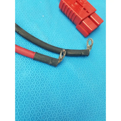 Black and red insulated battery charging connector cable with metal ring terminals rated 175a 800v for charging use