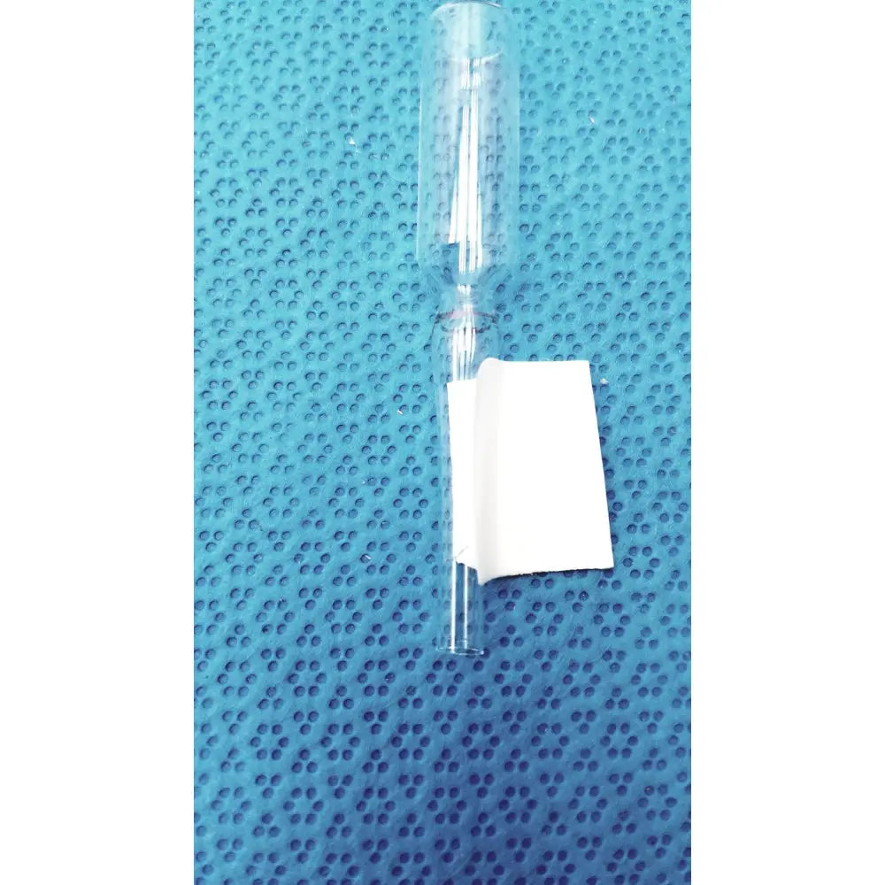 1ml clear glass ampoule low borosilicate with a white paper label wrapped around its lower section