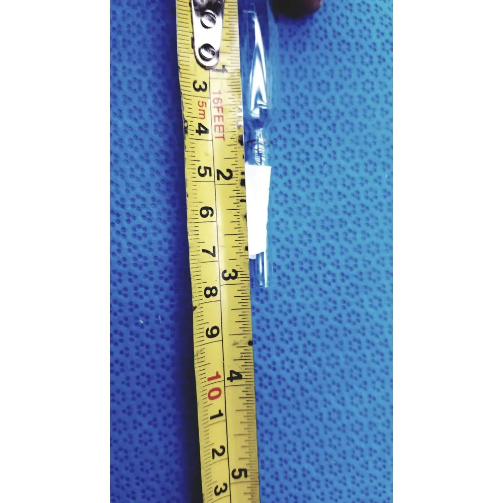 A 1ml clear glass ampoule low borosilicate ybb standard shown with a clear plastic-wrapped pen and yellow measuring tape