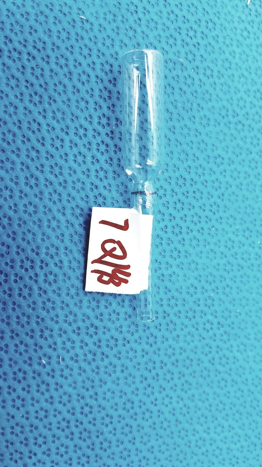 1ml clear glass ampoule low borosilicate with narrow neck and white label on clear glass vial body