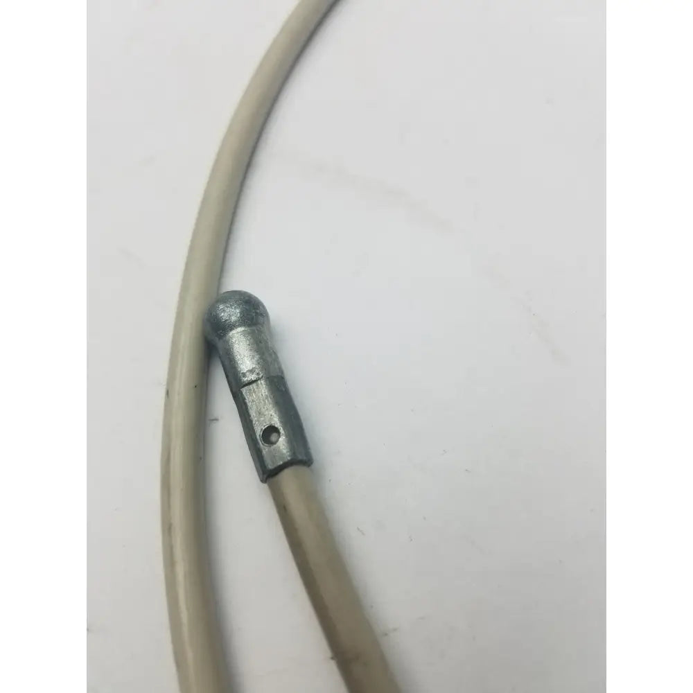 Gray metallic brake cable housing with silver rounded end cap and hole for attachment for sided cable g-bbdf6-59n
