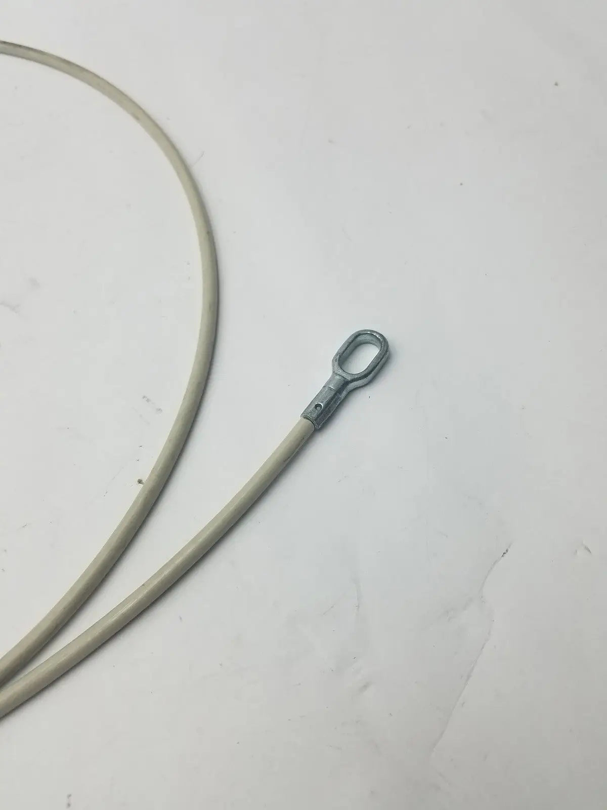 Beige insulated sided cable with metallic loop terminal for secure electrical connections g-bbdf6-59n