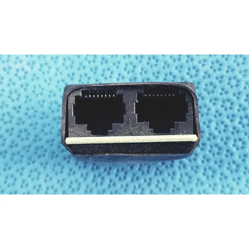 Black plastic 2-port female breakout adapter ethernet splitter with two rj45 ports and light-colored internal strip
