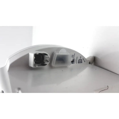 White plastic base of covidien kangro epump with integrated charging port and small transparent compartment back side