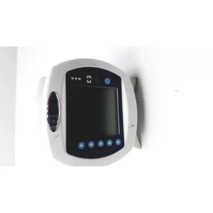 White wall-mounted medical device covidien kangro epump with black screen blue buttons and indicator lights serial c13078066