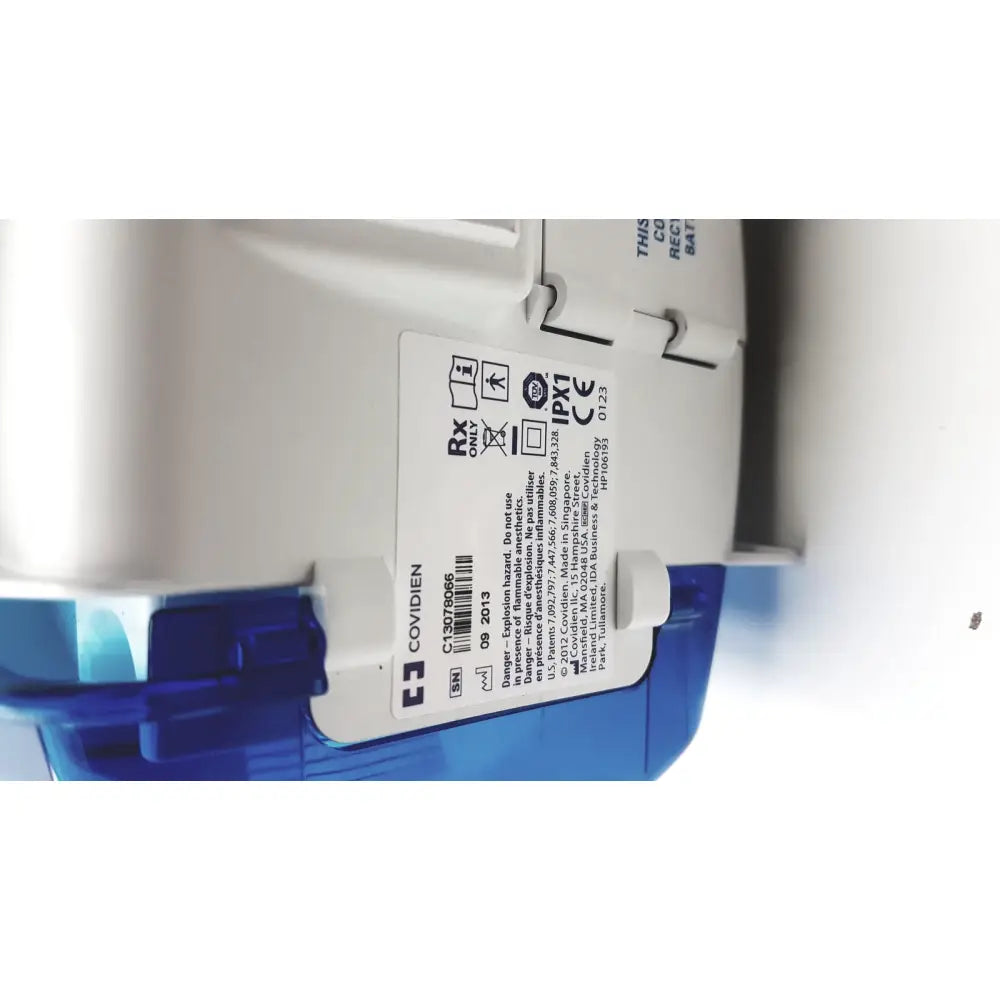 White and blue plastic covidien kangro epump medical device with regulatory markings and serial number c13078066