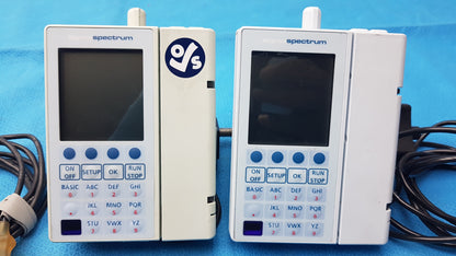 Lot of 2 Baxter Sigma Spectrum Infusion Pumps With AC Power Adapters P/N 35162