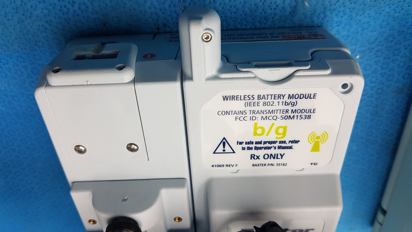 Lot of 2 Baxter Sigma Spectrum Infusion Pumps With AC Power Adapters P/N 35162
