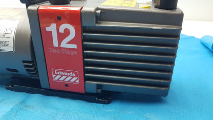 Edwards E2M-12 Dual Stage Rotary Vane Vacuum Pump With General Electric 3/4 HP Ac Motor M0D 5KC45PG1738T