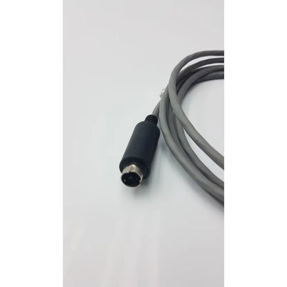 Gray coiled 10 pin cable with black connector and metallic circular plug for medical cable g-bbdd1-32r 2201564