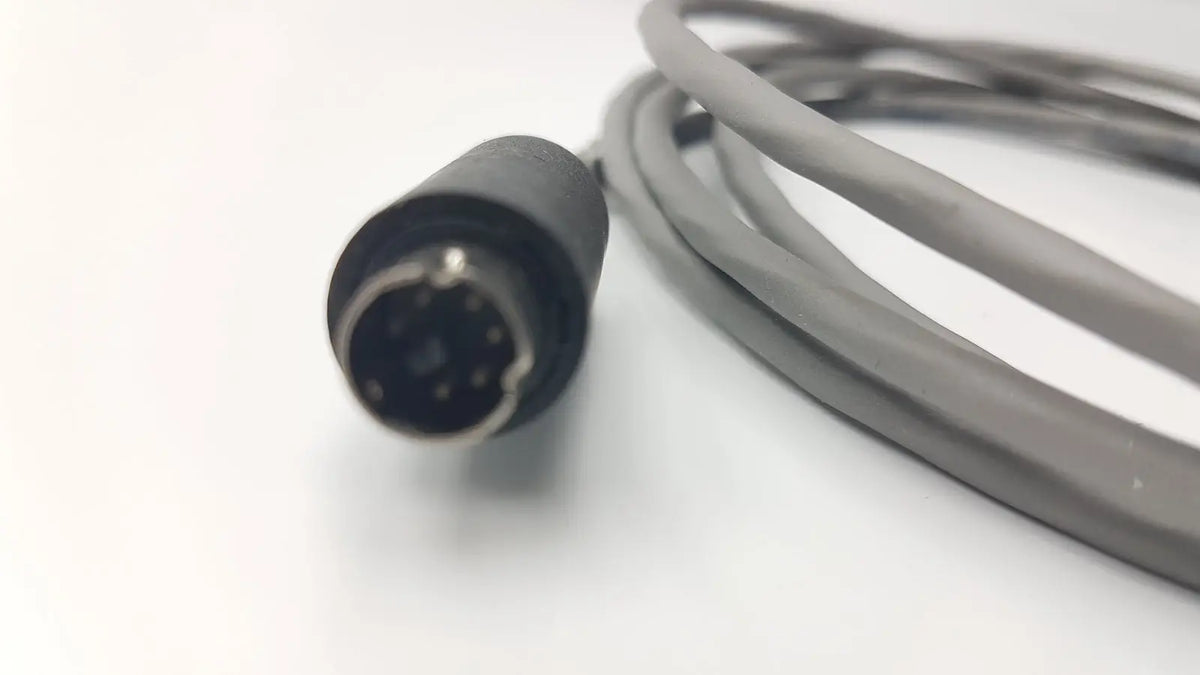 Gray coiled 10 pin cable with black 9-pin d-sub connector for medical cable g-bbdd1-32r product 2201564