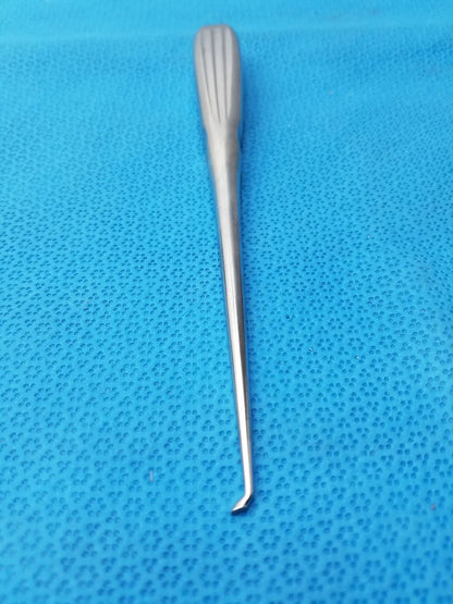 Silver spratt bone curette stainless surgical orthopedic instrument with textured ribbed handle and slender curved tip