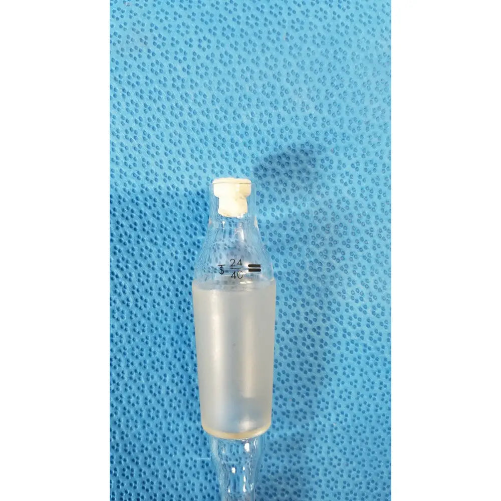 Clear plastic iv bag with white cap and measurement markings for use with 24/40 glass thermometer adapter lab thermometry tube