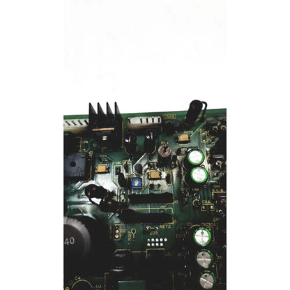 Green circuit board with black and silver electronic components of 2p8414t mother board 2n3k2053-crdid-2053b