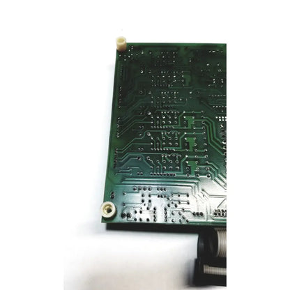 Green printed circuit board with intricate silver traces and solder points in 2p8414t mother board 2n3k2053-crdid-2053b