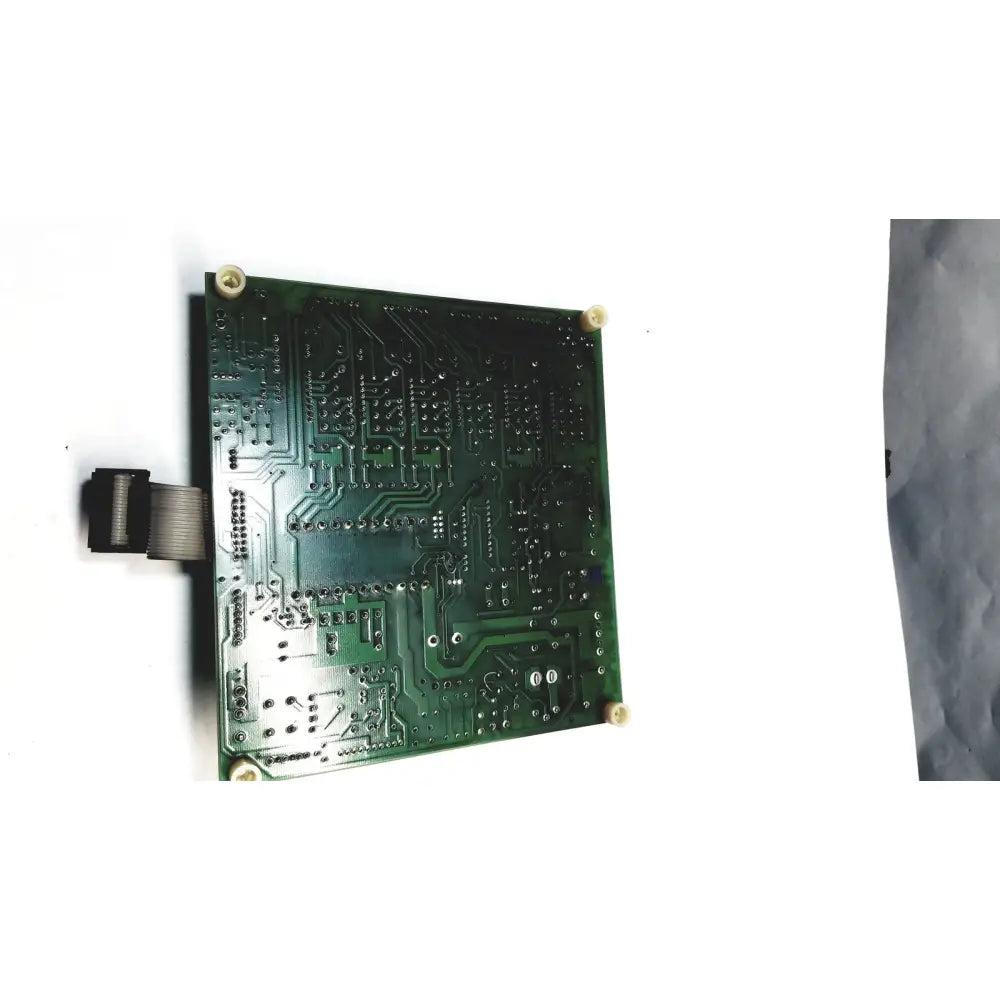 Green rectangular 2p8414t mother board with intricate copper traces and soldered components for electronic use