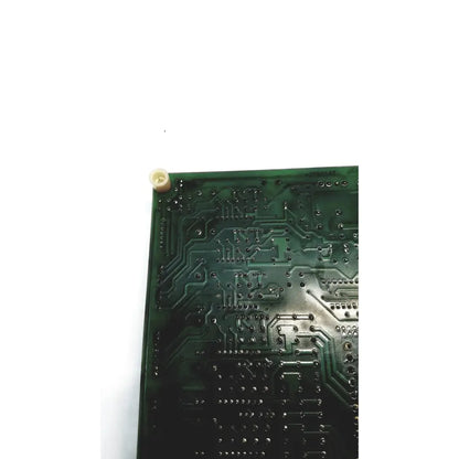 Green printed circuit board with intricate copper traces and solder pads of 2p8414t mother board model 2n3k2053-crdid-2053b