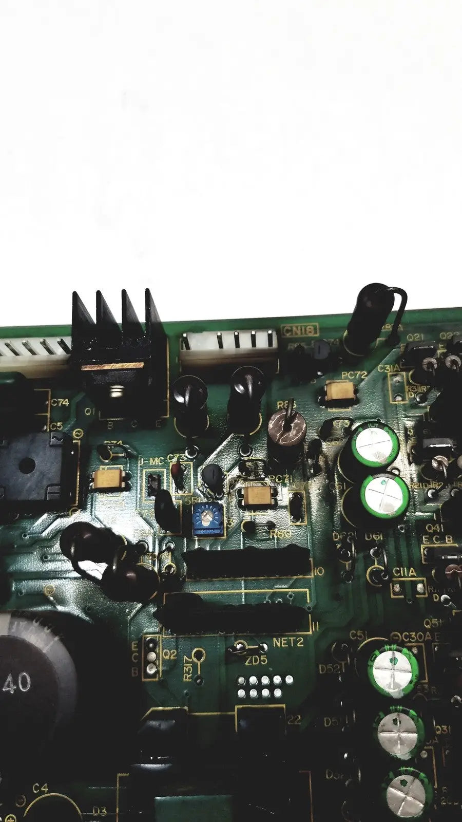 Green circuit board with black and silver electronic components of 2p8414t mother board 2n3k2053-crdid-2053b
