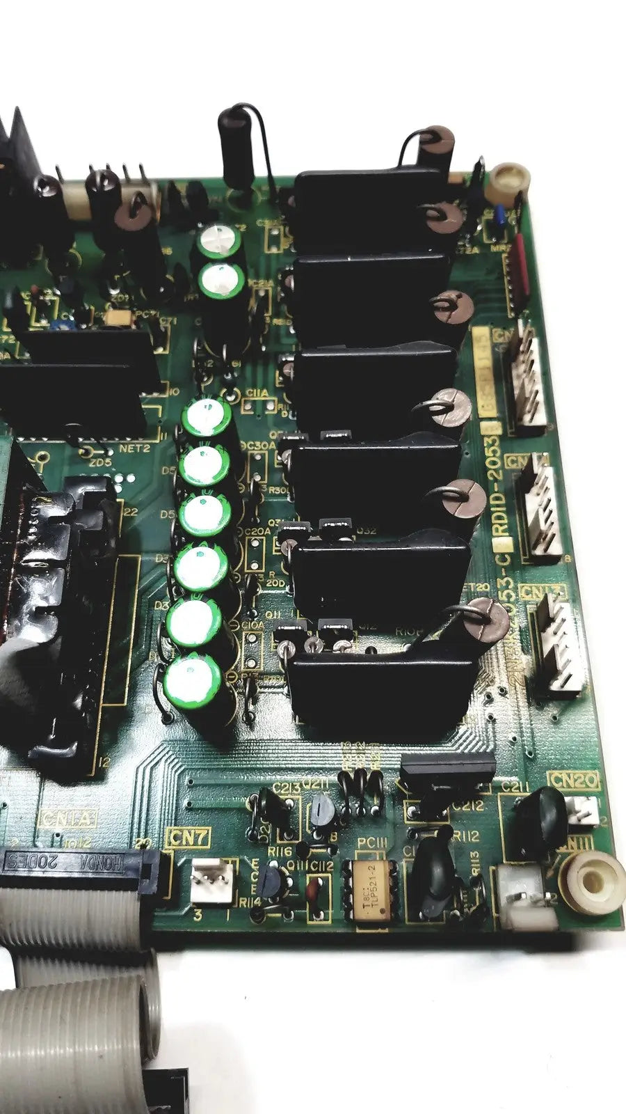 Green circuit board with black capacitors and green cylindrical components of 2p8414t mother board 2n3k2053-crdid-2053b