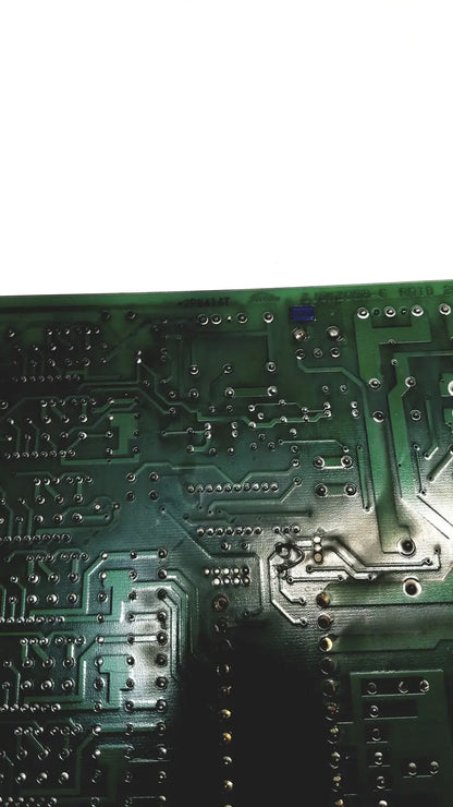 Green printed circuit board with silver conductive traces and soldered components for 2p8414t mother board model 2n3k2053-crdid-2053b