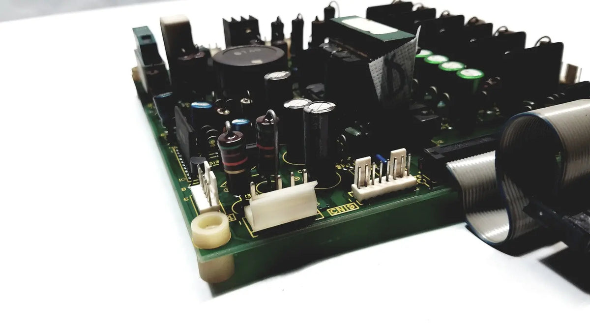 Green printed circuit board with black capacitors and connectors on 2p8414t mother board 2n3k2053-crdid-2053b