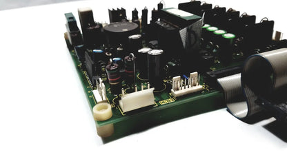 Green printed circuit board with black capacitors and connectors on 2p8414t mother board 2n3k2053-crdid-2053b