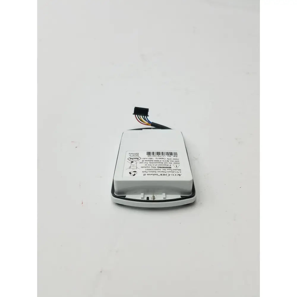 White rectangular 3.7V lithium battery pack with black connector and specifications label for accu-chek inform II