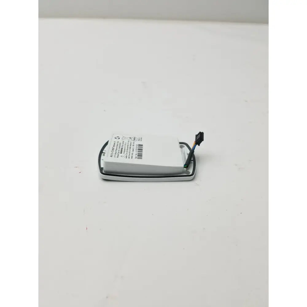 3.7v lithium battery pack for accu-chek inform ii with white rectangular adapter, black connector, and silver casing