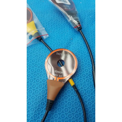 Circular metallic 3 leads snap sensor asm-0128-04 with orange trim black cables and brown connector for lbl-0307-01 recorder