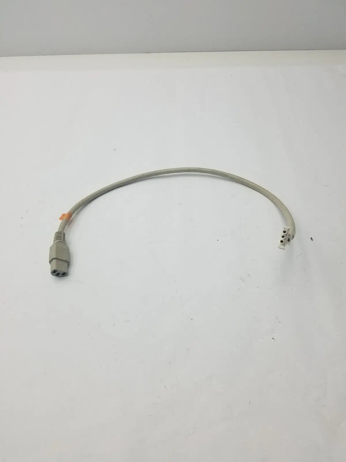 Gray 3-pin female cable with two three-prong connectors at each end for adapter connection use