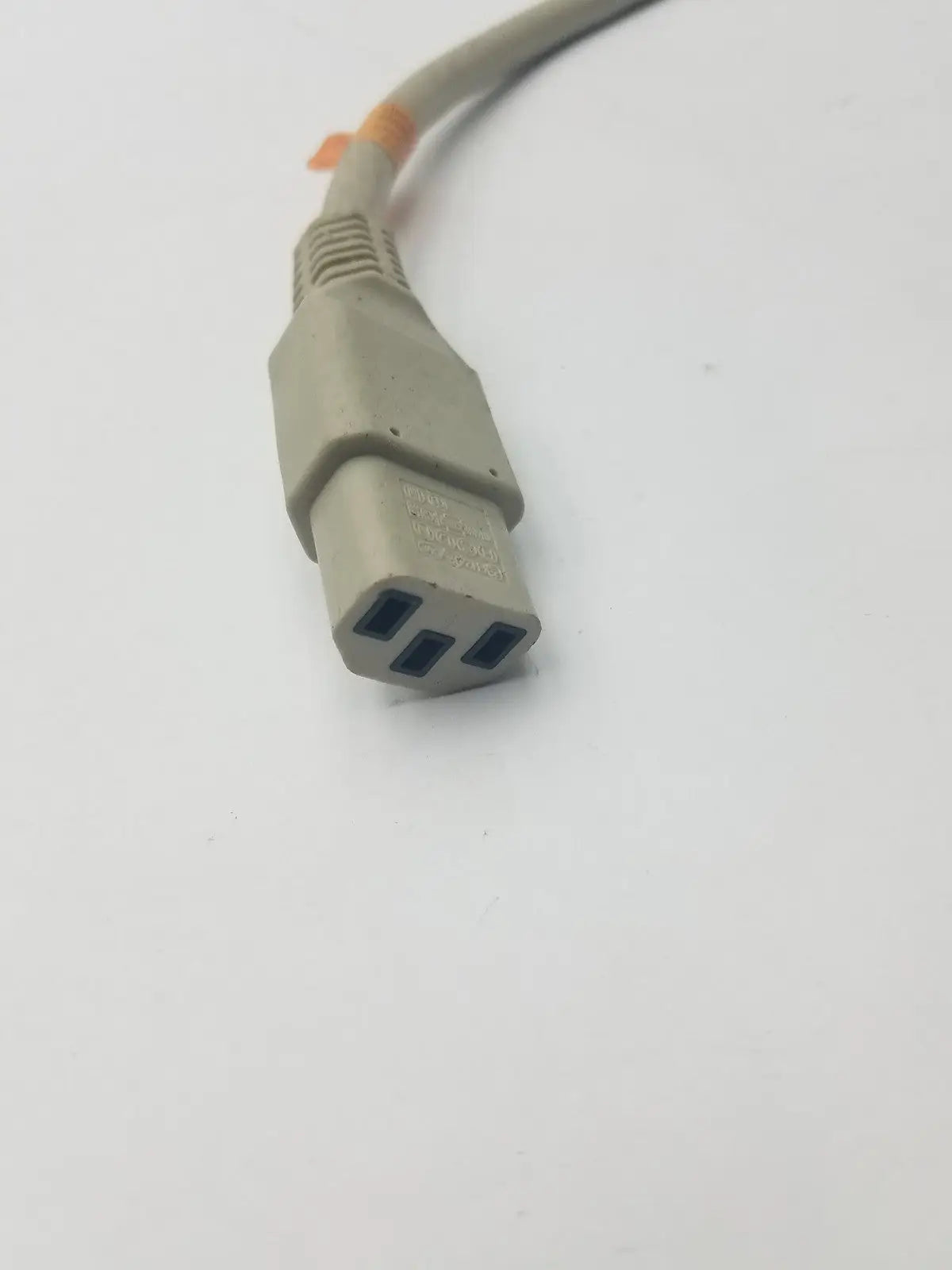 Gray 3-pin female cable with ribbed connector housing and three-pronged plug for adapter connection