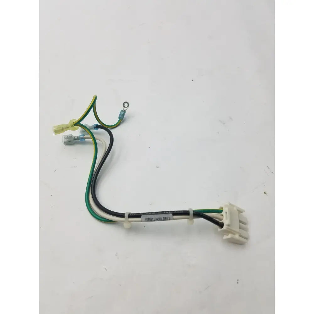 White plastic 3 pin female connector with green and black wires and label 45986174sbi on 4 wire cable rev b