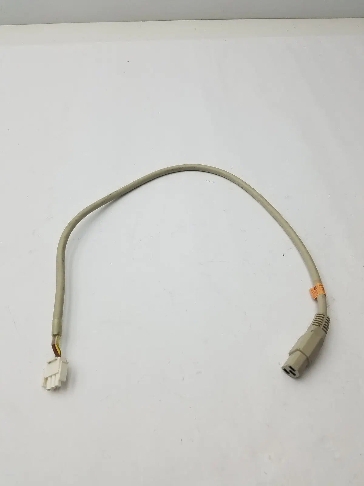 Beige 3 pin female adapter cable with rectangular and cylindrical connectors for versatile pin adapter cable connections