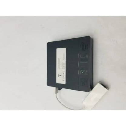 Black turing branded wireless network adapter with white usb cable attached to a 3 pin female connector cable