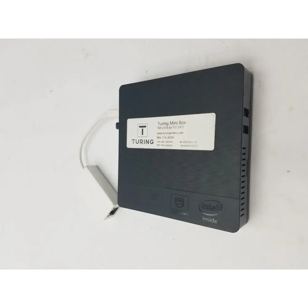 Black rectangular turing mini box with matte finish featuring intel logo and ventilation slits alongside pin female connector cable
